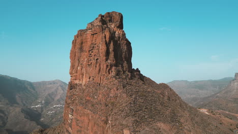 Roque-Bentayga:-flying-towards-the-famous-emblem-of-the-island-of-Gran-Canaria,-Tejeda,-Canary-Islands,-Spain