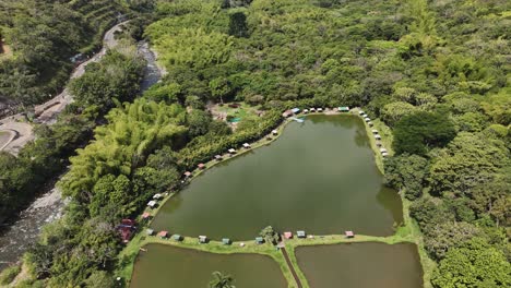 Drone-view-of-an-ecological-park-on-the-Pance-River,-on-the-outskirts-of-Cali,-Colombia