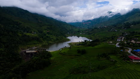 Rice-terraces-and-reservoir-in-valleys,-Sapa,-north-Vietnam