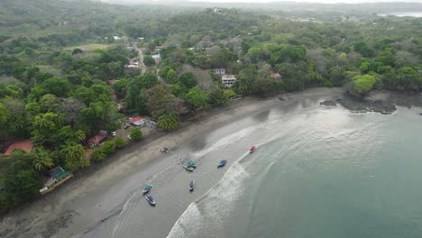 Sand-beach-with-fisher-boats-on-coast-Santa-Catalina-in-Panama-on-cloudy-day