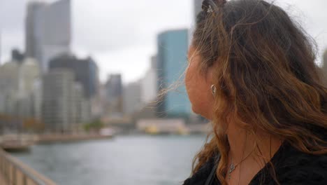 women-overlooking-downtown-Sydney-from-the-harbour