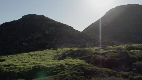 4K-Drone-Aerial-of-Backlit-Hills-And-Lush-Green-Bush-Filmed-Near-Scarborough-Western-Cape-South-Africa