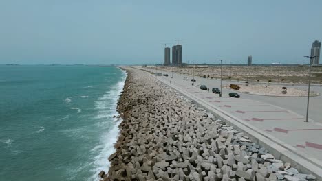 Drone-shot-of-the-great-wall-of-Lagos-and-Eko-Atlantic-City-viewpoint-looking-into-the-Atlantic-ocean