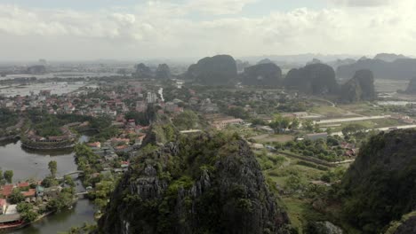 Cinematic-drone-aerial-shot-of-Tam-Coc-Ninh-Binh-in-Vietnam