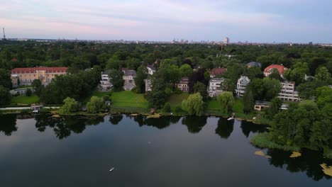 City-blending-with-nature-on-the-shores-of-a-lake,-Berlin-Grunewald-luxury-Mansion-Villas-on-a-lake