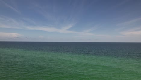 Drone-aerial-view-of-clear-waters-and-beach-of-Florida