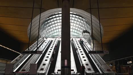 Escalators-within-Canary-Wharf-Station,-London,-United-Kingdom