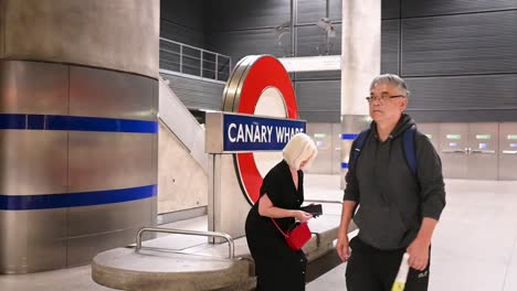 Sitting-down-within-Canary-Wharf-Station,-London,-United-Kingdom