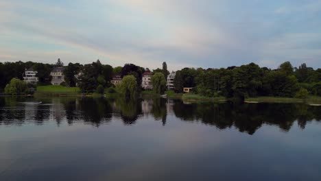 City-blending-with-nature-on-the-shores-of-a-lake,-Berlin-Grunewald-luxury-Mansion-Villas-on-a-lake