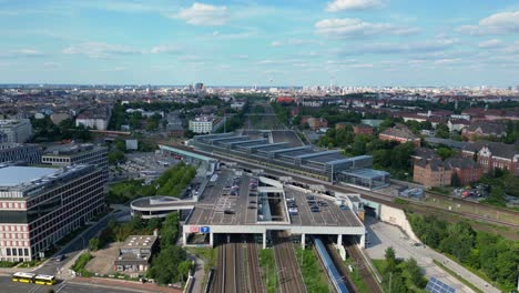 speed-ramp-hyper-motion-time-lapse-of-modern-train-station-platform-with-glass-roof-in-the-city-Berlin