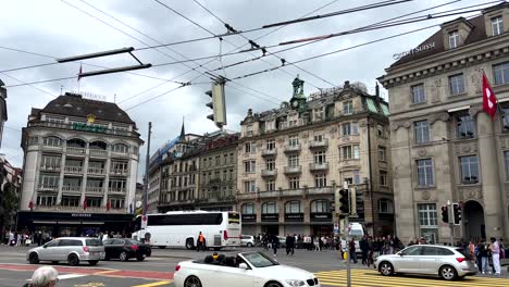 Old-town-with-historic-buildings-and-swiss-flag-of-Lucerne-Town