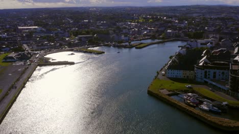 Aerial-shot-of-Claddagh-docks,-Galway-on-a-sunny-day