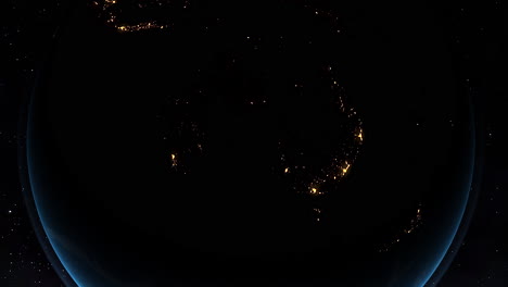 Night-view-of-Australia's-glowing-city-lights-from-space,-showcasing-the-vast-darkness-surrounding-it