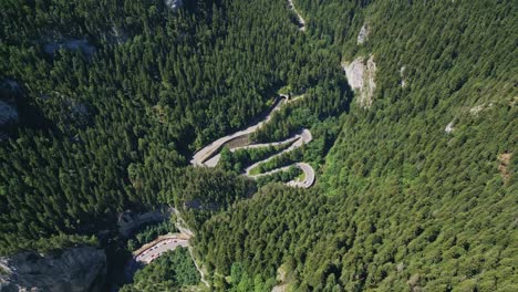 incredible-winding-roadway-in-the-Bicaz-Chei-gorge,-a-picturesque-road-in-Romania-crowded-with-tourists-during-the-summer-vacation-season