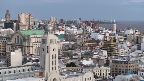 Drone-Shot,-Montevideo-Uruguay-Cityscape-Skyline,-Downtown-Buildings-and-Churches,-Panorama