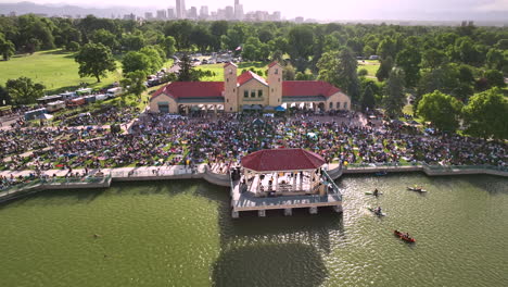 Aerial-pullback-reveals-crowd-attending-City-Park-Jazz-summer-event-in-Denver