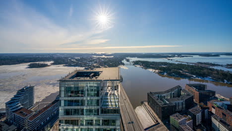 Moving-timelapse-overlooking-the-Helsinki-archipelago-from-the-kalasatama-tower,-spring-in-Finland