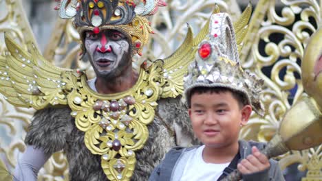 Indonesian-performers-in-elaborate-costumes-at-Taman-Fatahillah,-Jakarta