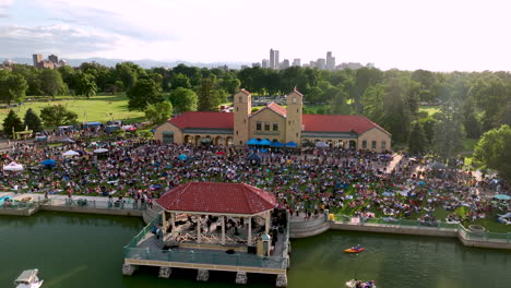 Festivalgoers-at-City-Park-Jazz-free-concert-at-Pavilion-of-Ferril-Lake,-aerial