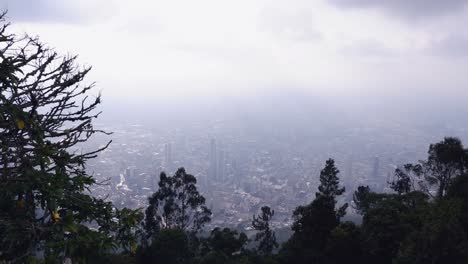 City-skyline-pan-across-hazy-Bogota-Colombia-from-Monserrate-viewpoint