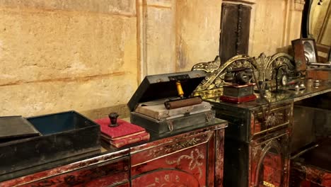 Panning-shot-of-old-and-vintage-things,-antique-things-at-Kothari's-Patwon-Ki-Haveli-or-Patwa-Haveli-Jaisalmer-Rajasthan-India-4K