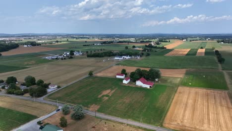 Rural-american-landscape-with-agricultural-fields-and-farm-homes