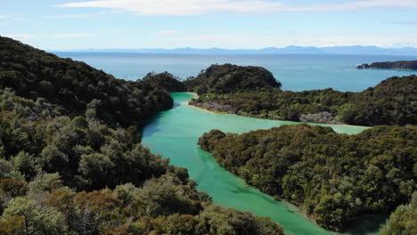 Turquoise-sea-water-and-mountains-drone-4k-New-Zealand