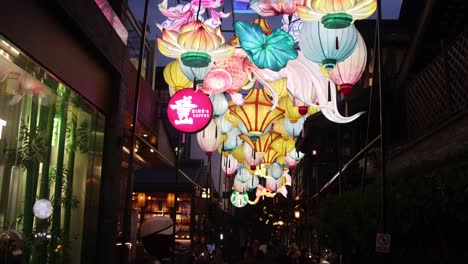 Vibrant-and-colorful-lanterns-hanging-in-a-street-festival-in-Chengdu,-China,-creating-a-festive-and-lively-atmosphere