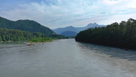 Fly-over-the-Squamish-River-valley-in-Squamish,-British-Columbia,-Canada