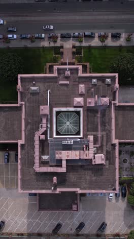 Vertical-Top-Down-Drone-Shot,-Pacific-Union-Social-Club-Building,-Sand-Francisco,-California-USA