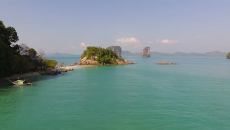 4K-aerial-drone-footage-of-flight-over-the-Thai-beach-and-rocks,-Thailand,-Asia,-Andaman-sea,-Pakbia-Island