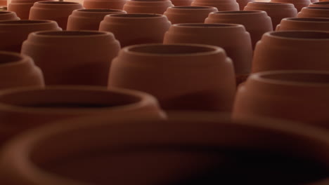 close-up-view-of-ceramic-pot-artisan-craftsman-making-pottery-and-left-them-dry-out-at-sun