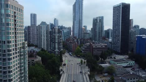 Burrard-Street,-downtown-Vancouver,-urban-traffic,-transport-systematic