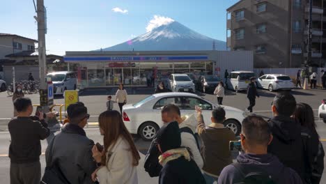 Tourists-in-Front-of-Famous-Lawson-with-Mount-Fuji-in-the-Background