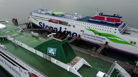 Aerial-rising-view-overlooking-Irish-Ferries-and-Stena-line-passenger-ships-docked-at-Holyhead