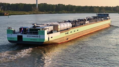 Sunset-Panoramic-Close-Up-of-an-Ecotanker-and-Container-Vessel-at-Barendrecht-Port,-Netherlands---Industrial-Shipping-and-Logistics