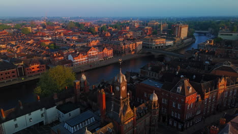 Pullback-Establishing-Aerial-Drone-Shot-over-York-City-at-Beautiful-Sunrise-UK