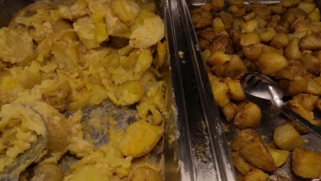 Fried-Potato-Meals-in-Buffet-Restaurant,-Close-Up