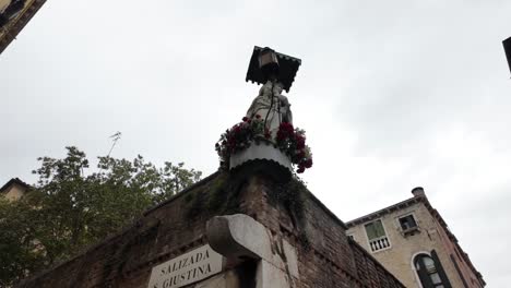 Perspective-shot-of-statue-of-madonna-with-child