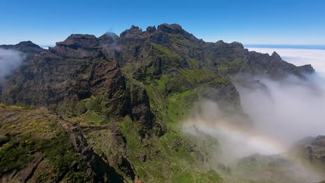 Bright-green-vegetation-on-rocky-steep-landscape-of-Madeira-Island