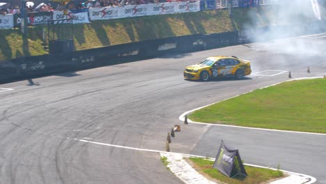 Golden-race-car-drifting-and-burning-tires-with-lots-of-smoke