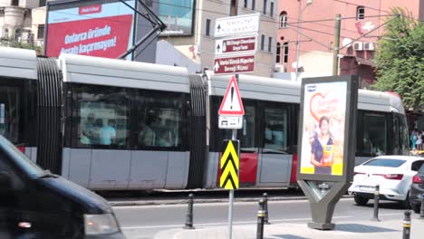 Capturing-vibrant-and-dynamic-traffic-on-the-streets-of-Istanbul,-Turkey,-including-cars,-taxis,-trams,-and-buses