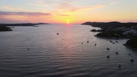 Drone-flight-over-the-seawater-at-sunset-near-Hvar-island-in-Croatia