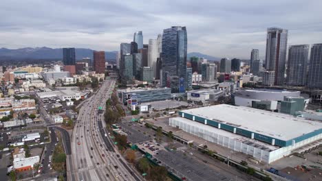 Los-Angeles-USA,-Aerial-View-of-California-CA-110-State-Route-and-Downtown-Buildings,-Harbor-Freeway,-Crypto