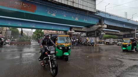 Many-men-stand-under-a-bridge-waiting-for-the-rain-to-stop