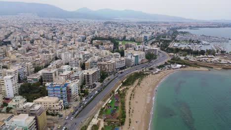 Marina-port-in-Piraeus-Greece,-Athens-coastline-beach-Aegean-sea-aerial-Marina-port-in-Piraeus