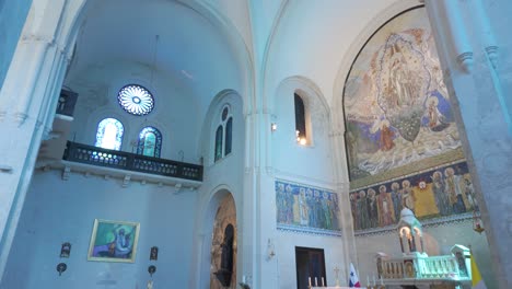 Interior-of-Saint-Francis-of-Assisi-Church-with-stained-glass-and-murals-in-Casco-Viejo,-Panama-City