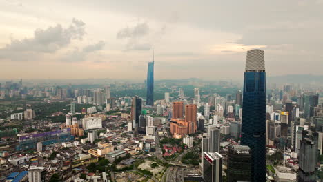 Buildings-of-testaments-to-human-ambition,-cityscape-skyline,-aerial