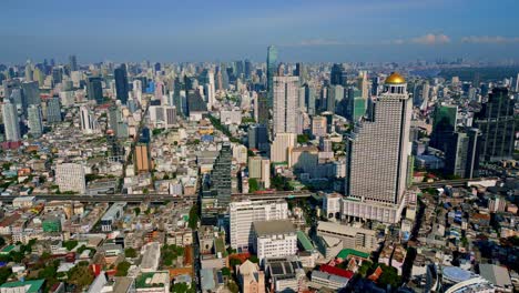 Bangkok-Downtown-With-Sathorn-Unique-Tower-In-Sathon-District,-Thailand