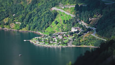 A-tilt-shift-timelapse-of-camping-on-the-shore-of-a-Geiranger-fjord,-Beautiful-landscape